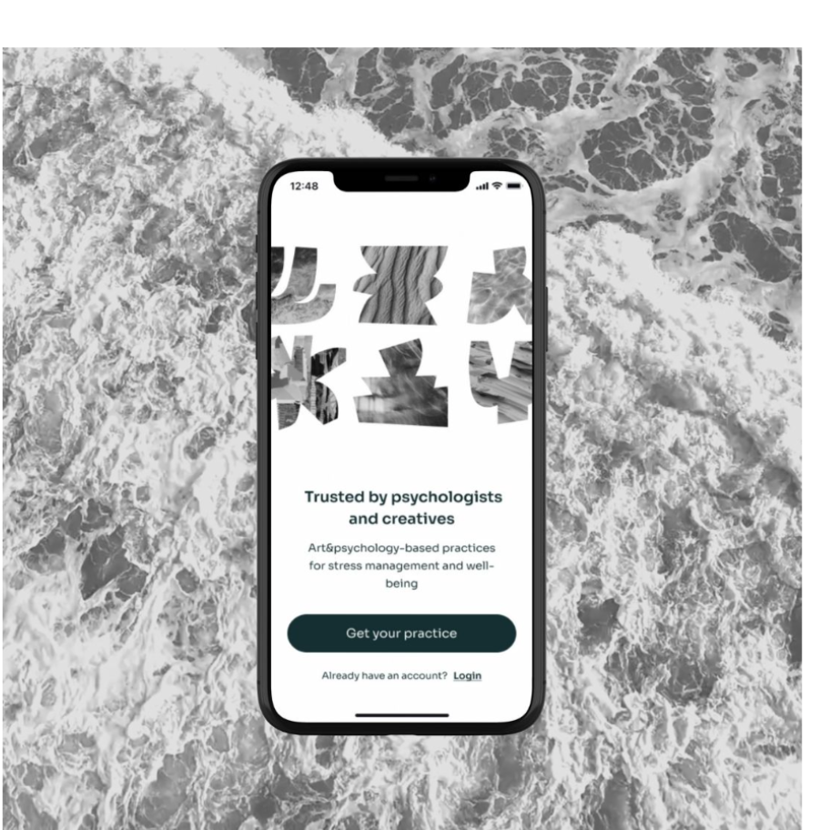 The Maramora app on a phone over storm waves